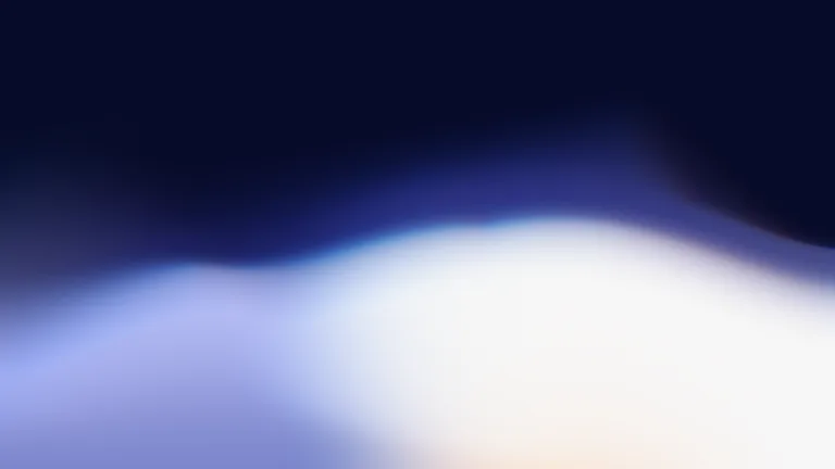 Indigo waves rising into a luminous white edge.