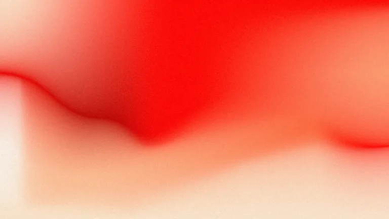 A vermilion sweep dissolving into warm peach, with tactile grain.