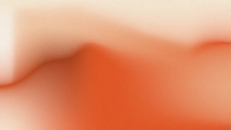A vermilion sweep dissolving into warm peach, with tactile grain.
