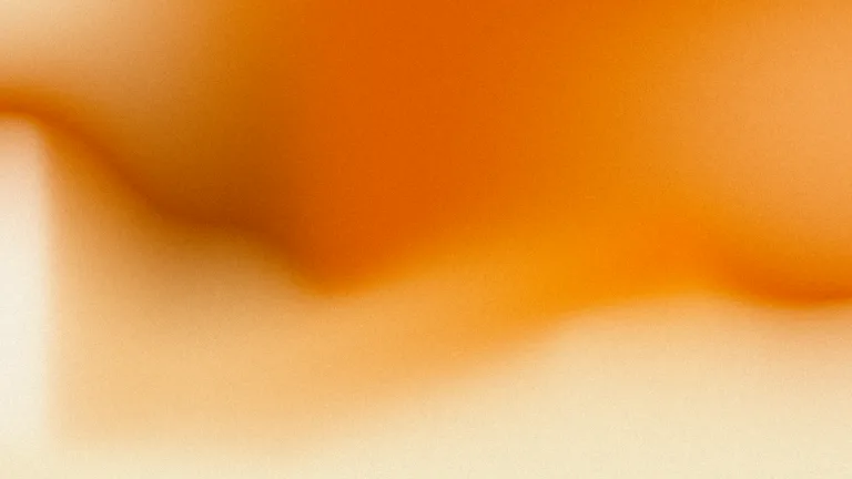 Ember Wash: A vermilion sweep dissolving into warm peach, with tactile grain.